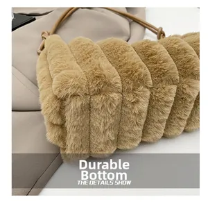 Detailed view of plush shoulder bag featuring a durable wear-resistant bottom and soft fur