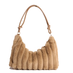 Brown faux fur hobo shoulder bag with striped texture and knotted leather strap