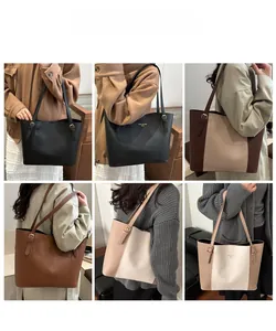 Multiple colors of large leather tote bag shown on model with adjustable gold buckle