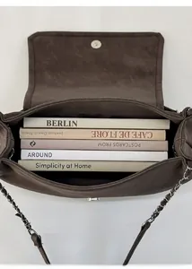 Large capacity dark brown bag interior showing ample storage space for books and items