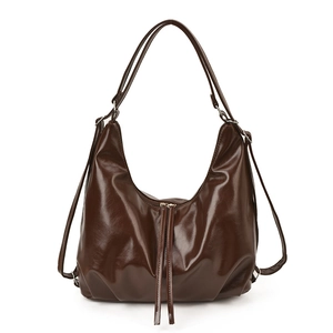 Retro brown glossy leather tote bag with long tassel zippers and versatile straps