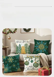 Detail of four Christmas pillow covers featuring green trees and snowflake patterns
