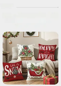 Detailed close-up of four Christmas pillow covers with festive prints in a cozy home setting