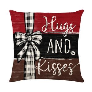 Valentine's Day striped throw pillow cover with buffalo plaid bow and Hugs and Kisses text