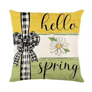Daisy print cushion cover with Hello Spring text and cotton linen texture on white background
