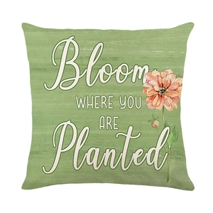 Fodera per cuscino in lino verde con fiori e testo motivazionale Bloom per divani