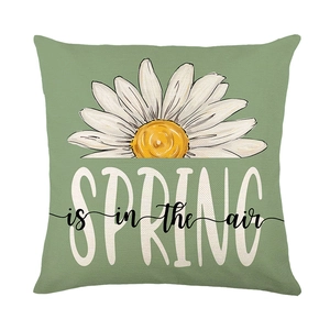 Green spring pillow cover with white daisies and 'SPRING is in the air' text print