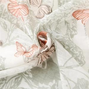 Floral cotton linen scarf with soft butterfly print in sage green and orange tones