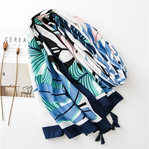 Tropical leaf print oversized beach scarf with tassels and colorful mixed patterns
