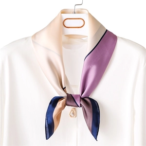 Elegant multi-color geometric silk scarf for women featuring a golden pearl pendant accent
