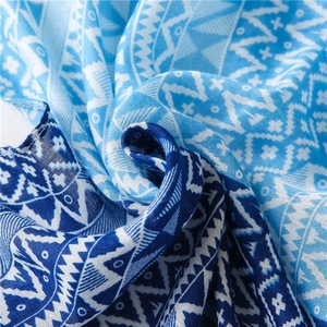 Detailed view of bohemian blue diamond pattern scarf with intricate geometric motifs