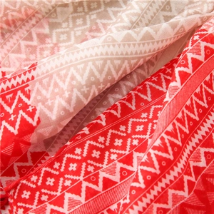 Macro view of blue geometric diamond pattern on lightweight summer sun protection shawl scarf