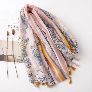 Pink and purple paisley print scarf with floral patterns and soft decorative tassels