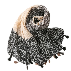 Bohemian geometric pattern scarf with tassels in black and white knit fabric