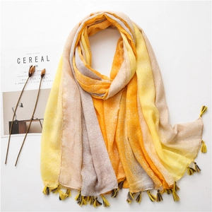 Gradient cotton linen shawl in yellow and orange with fringes and a modern starry design