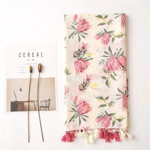Floral cotton linen scarf for women with pink king protea print and tassel details