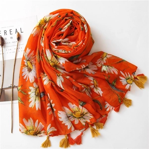 Orange cotton linen scarf with white daisy print and handmade tassel fringe detail