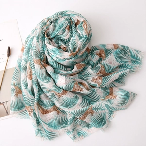 Lightweight tropical leaf and leopard print cotton linen shawl with frayed edges