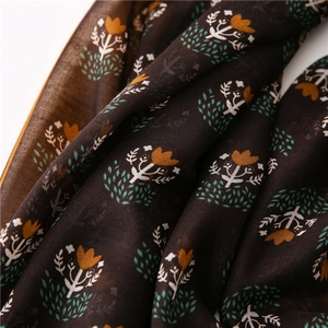 Retro ethnic brown cotton linen scarf with orange floral print and bohemian tassels