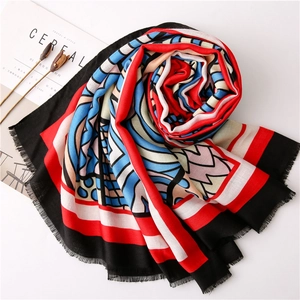 Abstract geometric scarf in blue and red with soft fringe edges for women