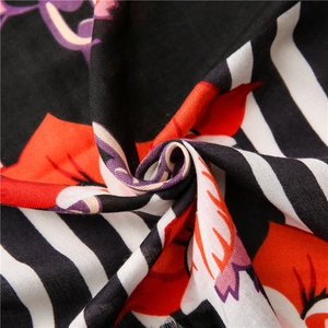 Zebra stripe scarf with floral patterns made of soft breathable fabric