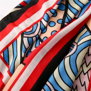 Abstract long scarf with blue geometric animal prints in lightweight cotton-feel fabric