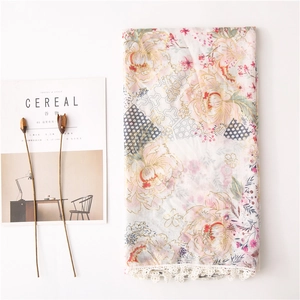 Beige floral scarf with red flowers, gold outlines and delicate white lace trim edge