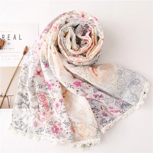 Floral cotton scarf with lace edges and gold patterns shown in a stylish layout