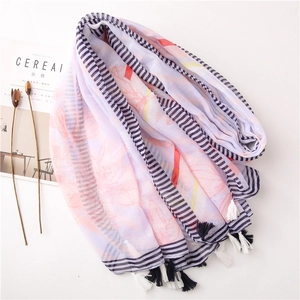 Lightweight lavender floral beach scarf with tassels and striped borders for sun protection