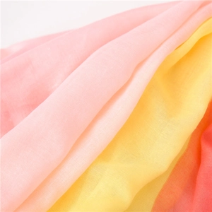 Detail of color gradient cotton linen scarf showing soft texture and fine weave pattern
