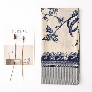 Beige floral cotton linen feel square scarf with navy blue botanical patterns and borders