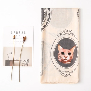Beige cotton cat print square scarf with black classical frame patterns on a white background