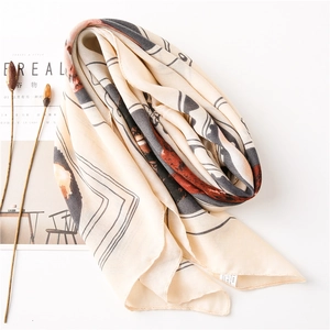 Lightweight square cotton shawl with abstract cat pattern on a Cereal magazine background