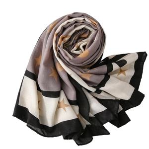 Star pattern winter scarf with grey and beige color block panels and black border