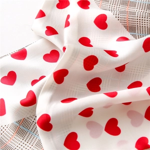 Elegant thin silk scarf for women featuring red heart prints and houndstooth pattern details