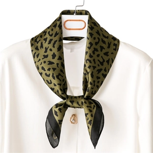 Classic leopard print silk square scarf in deep green with black borders on white shirt