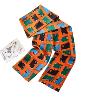 Écharpe étroite en soie orange avec imprimé animalier artistique pour femmes