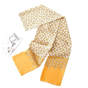 Elegant yellow and white silk scarf featuring vintage C-pattern prints on white background