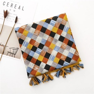 Detailed view of colorful checkerboard cotton linen scarf with soft fringe edges