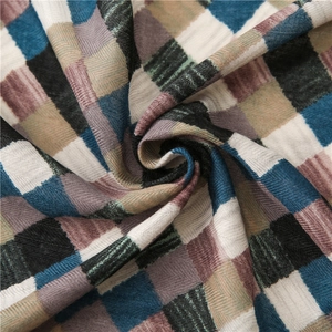 Detailed swirl texture of a plaid cotton linen scarf with deep blue and grey weave