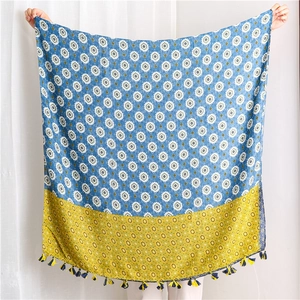 Bohemian style long cotton scarf with geometric pattern and tassels in blue and yellow