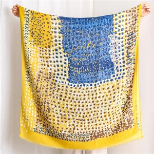Detailed texture of cotton linen scarf with abstract colorful oil painting pattern and fringe