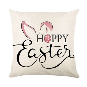 Linen Easter pillow cover with bunny ears and Hoppy Easter text on white background