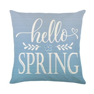 Blue floral pillow cover with hello SPRING text on textured polyester fabric