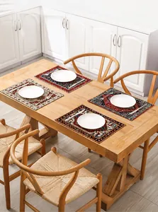 Detail of bohemian placemats with intricate geometric patterns on a wooden table
