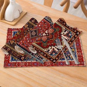 Bohemian cotton linen placemats with Persian patterns on a wooden table with cutlery