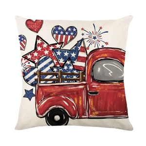 Independence Day pillow cover featuring a red vintage truck and patriotic star elements