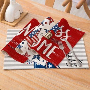 Set of 4 Independence Day table mats with red, white, and blue patriotic star prints