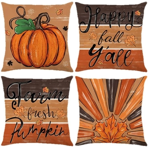 Set of four autumn throw pillow covers featuring pumpkins and maple leaf designs