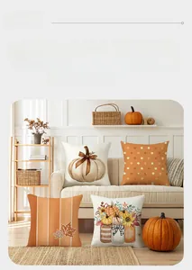 Close-up of autumn pumpkin and maple leaf patterns on soft decorative pillowcases